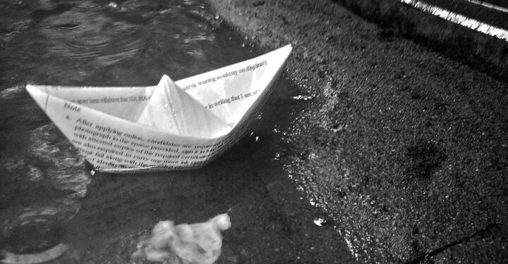Paper boats with messages