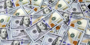 An image featuring money, that is, dollar bills.